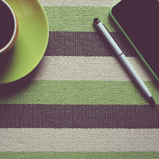 Coffee, pencil and phone. How to organise your time at work.